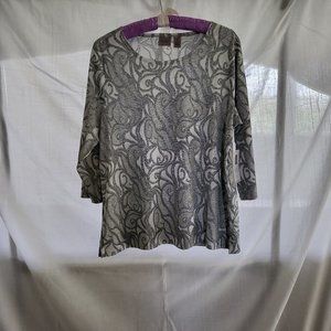 Chicos Easy wear. Silver pull over top. Foreign size: 2 wears like a 14